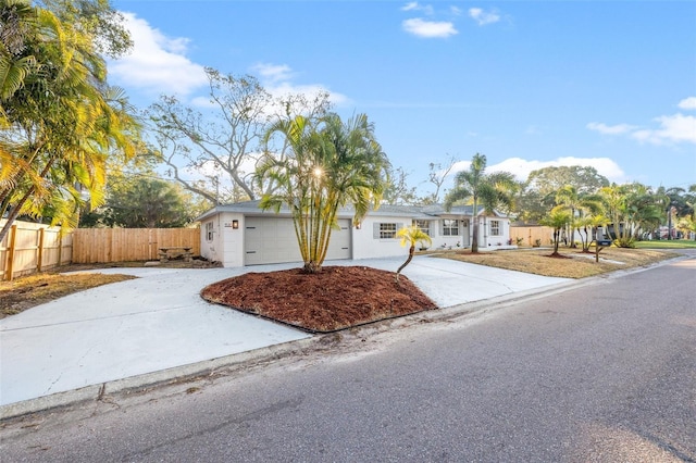 single story home with a garage