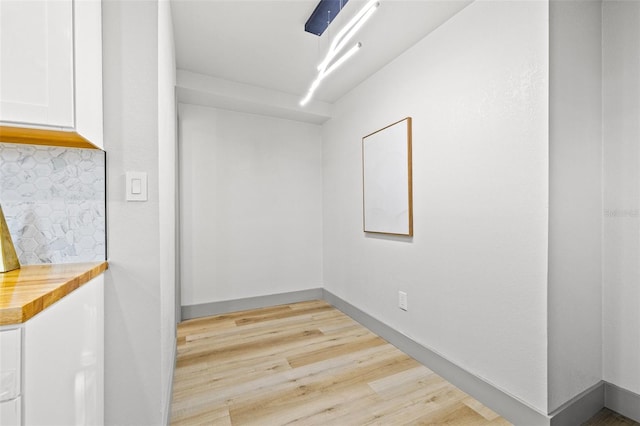 unfurnished room with light hardwood / wood-style floors