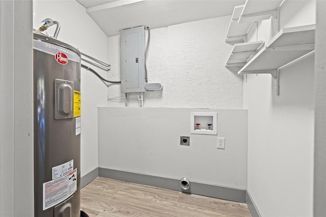 washroom with water heater, washer hookup, electric panel, hookup for an electric dryer, and light wood-type flooring