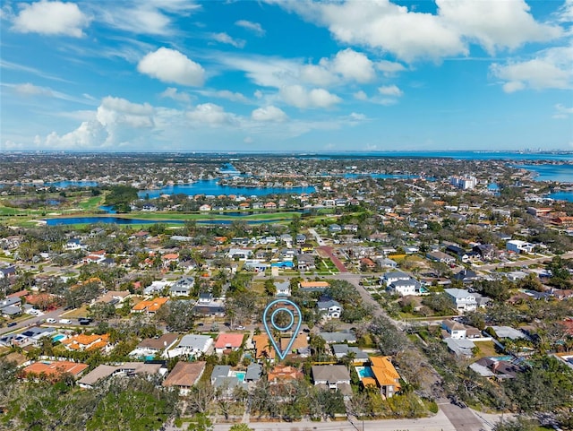 drone / aerial view with a water view