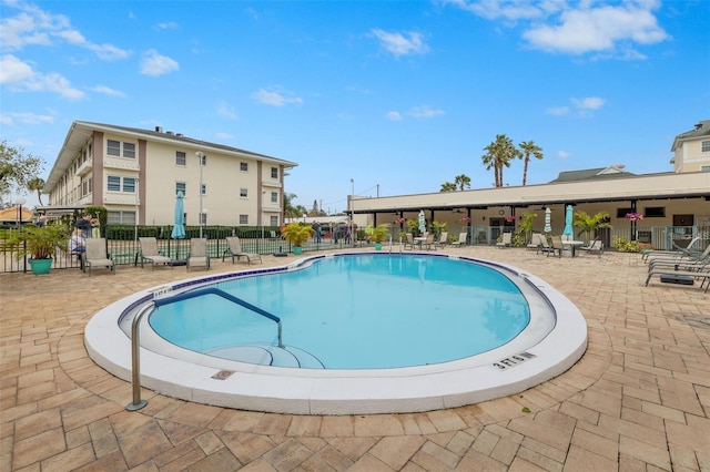 view of pool featuring a patio area