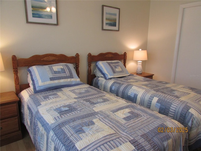 bedroom featuring wood-type flooring