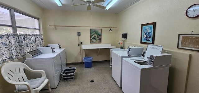 laundry room featuring ceiling fan and washer and clothes dryer