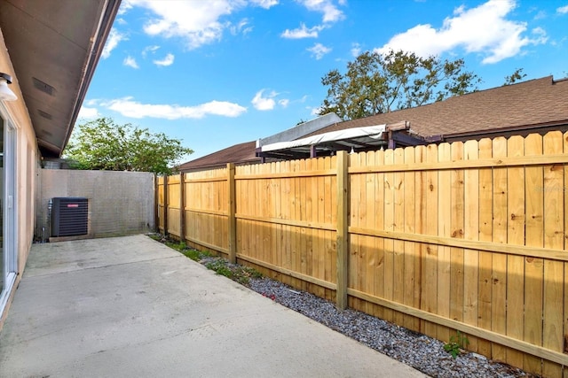 view of patio with cooling unit