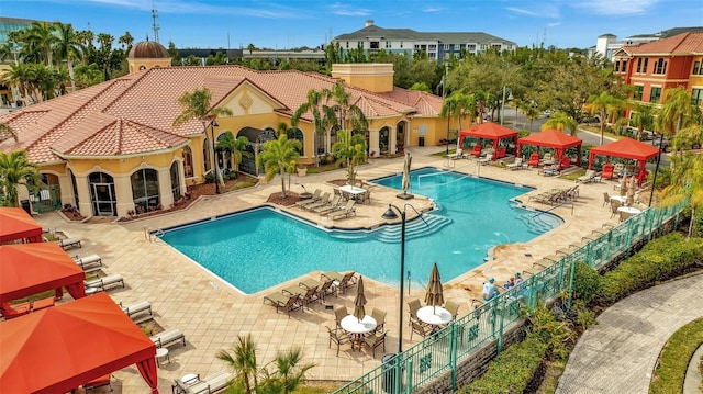 view of pool featuring a gazebo and a patio area