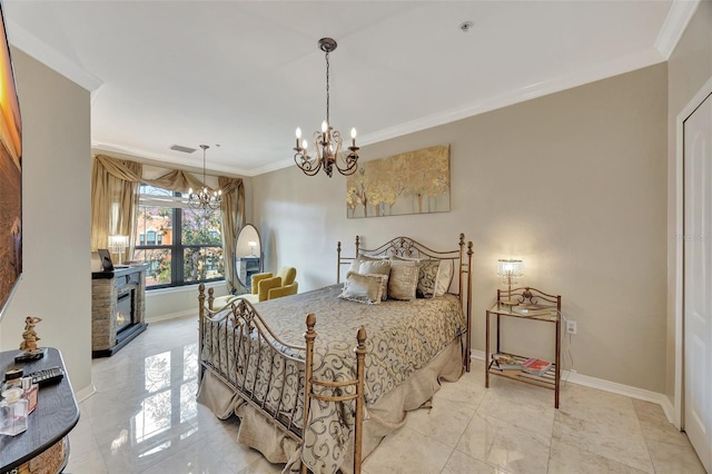 bedroom featuring crown molding, a stone fireplace, and an inviting chandelier