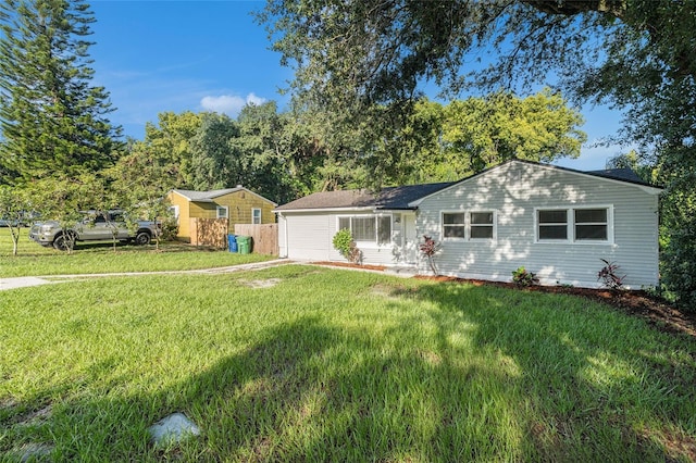 ranch-style house with a front yard