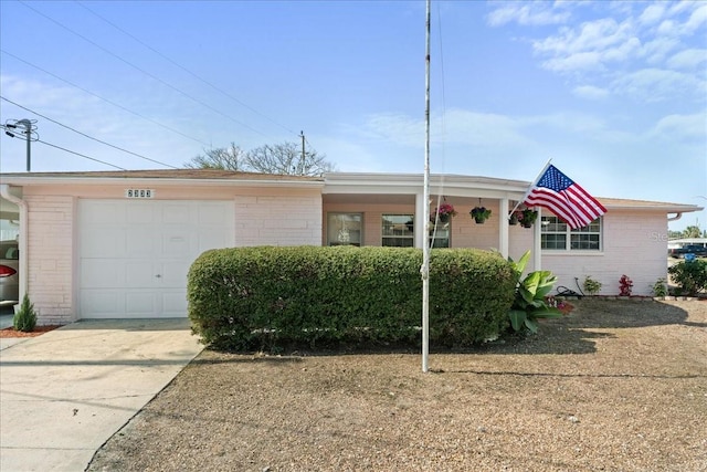 ranch-style home with a garage