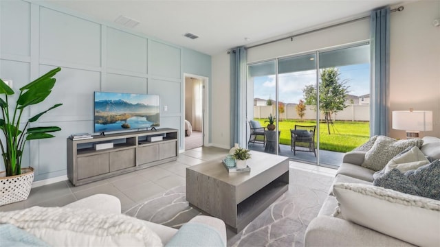 living room featuring light tile patterned floors