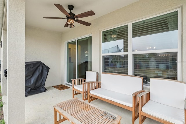 view of patio / terrace featuring a grill and ceiling fan