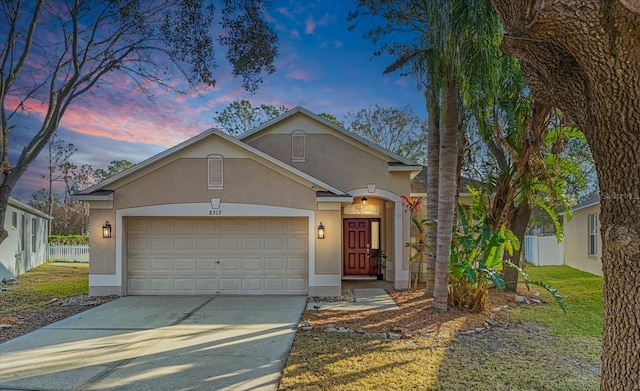 view of front of property with a garage