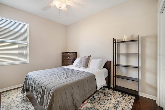 bedroom featuring ceiling fan and hardwood / wood-style floors