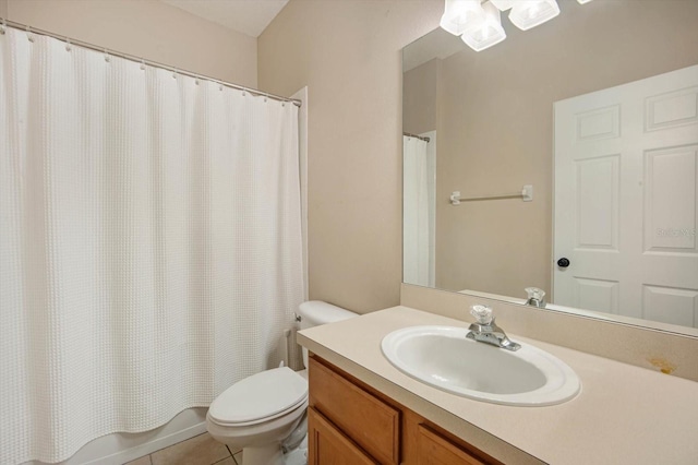 full bathroom featuring vanity, shower / tub combo, tile patterned floors, and toilet