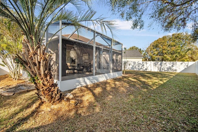 view of yard with a lanai