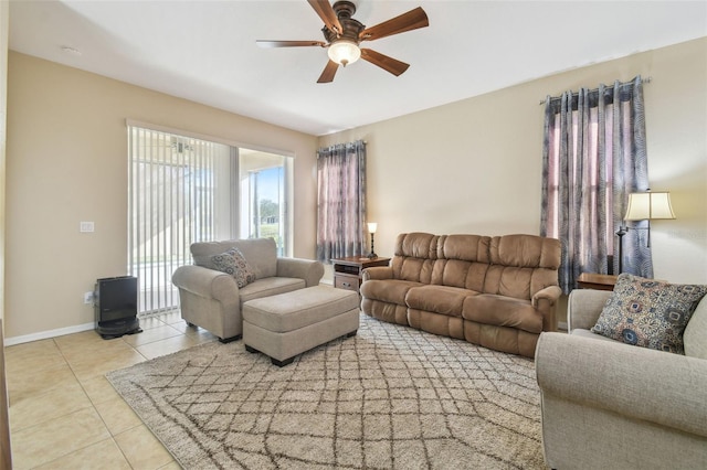 living room with light tile patterned flooring and ceiling fan