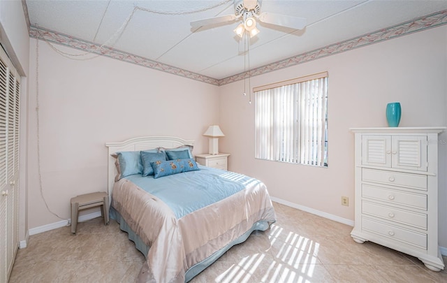 bedroom featuring ceiling fan