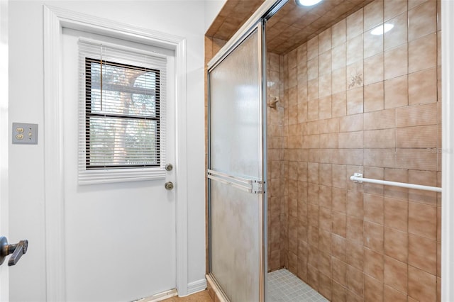 bathroom with an enclosed shower