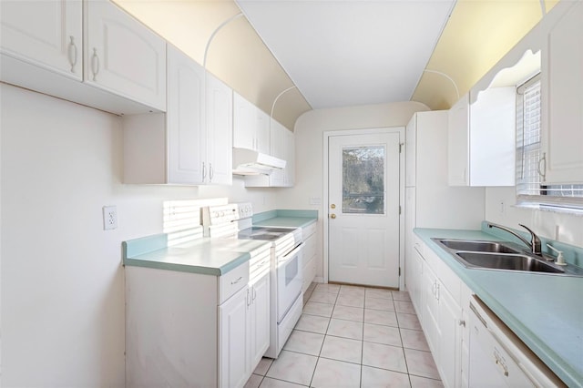 kitchen featuring sink, white appliances, light tile patterned floors, and white cabinets