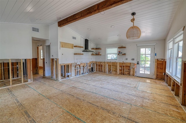 interior space with lofted ceiling with beams