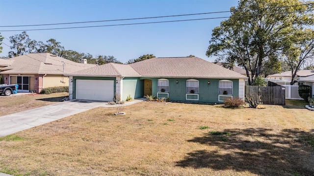 ranch-style home with a garage and a front lawn