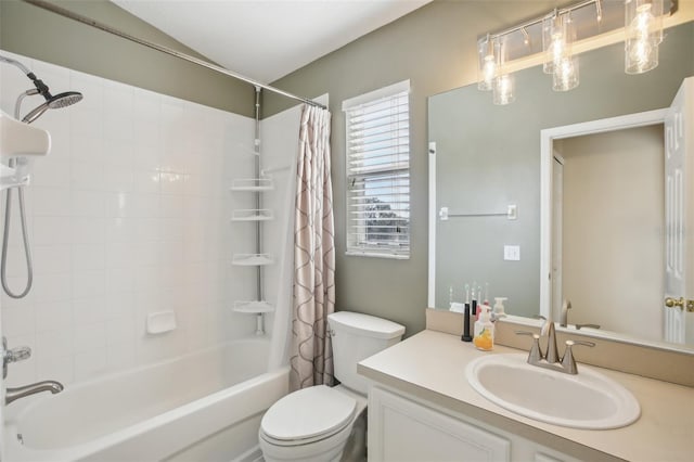 full bathroom featuring vanity, toilet, and shower / bath combo with shower curtain