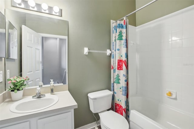 full bathroom with shower / tub combo with curtain, vanity, and toilet