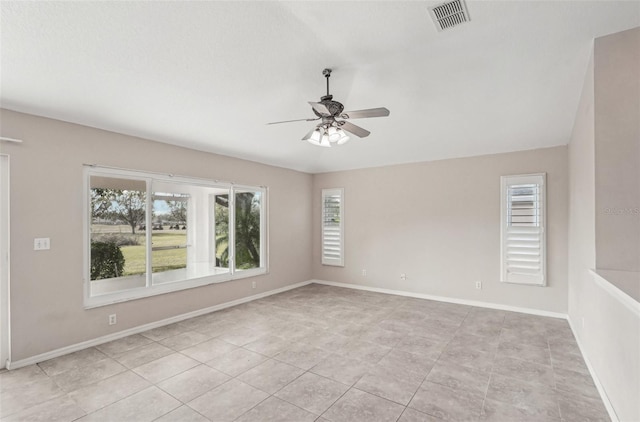 spare room featuring ceiling fan