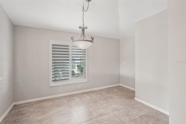 spare room featuring light tile patterned floors