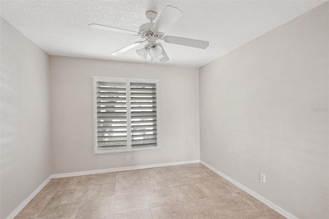 unfurnished room with a textured ceiling and ceiling fan