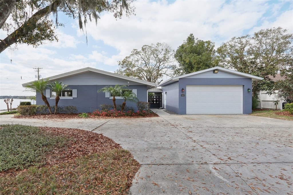 ranch-style home with a garage