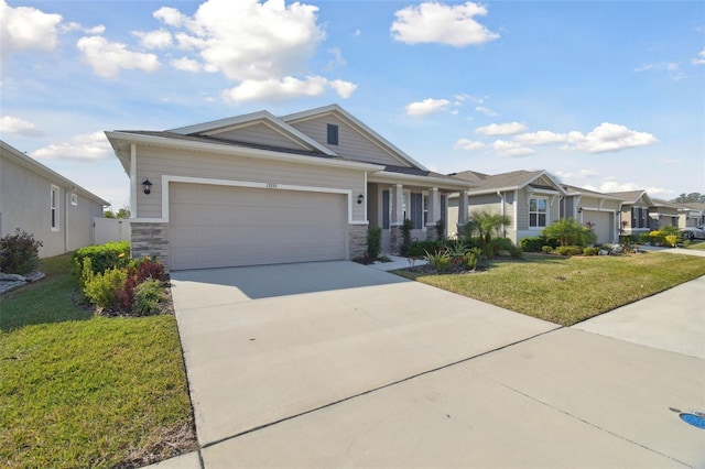 view of front of house with a garage and a front yard