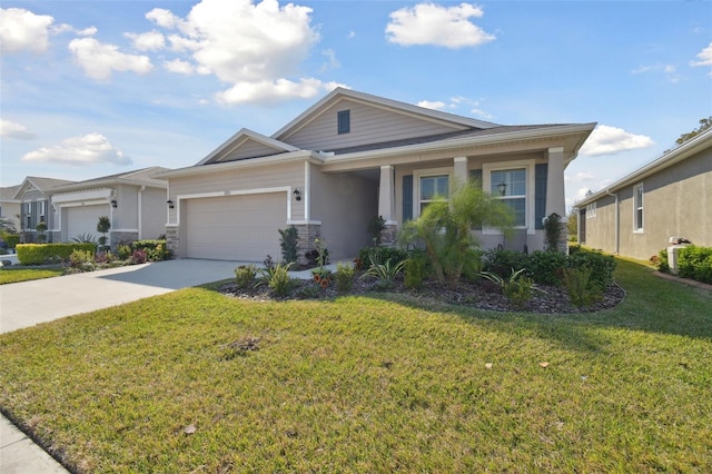 view of front facade with a garage and a front yard