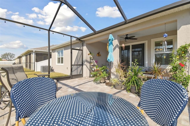 exterior space featuring ceiling fan