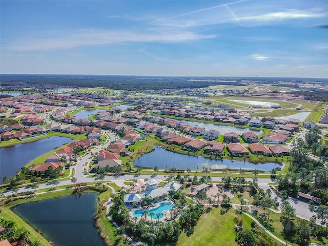 bird's eye view with a water view