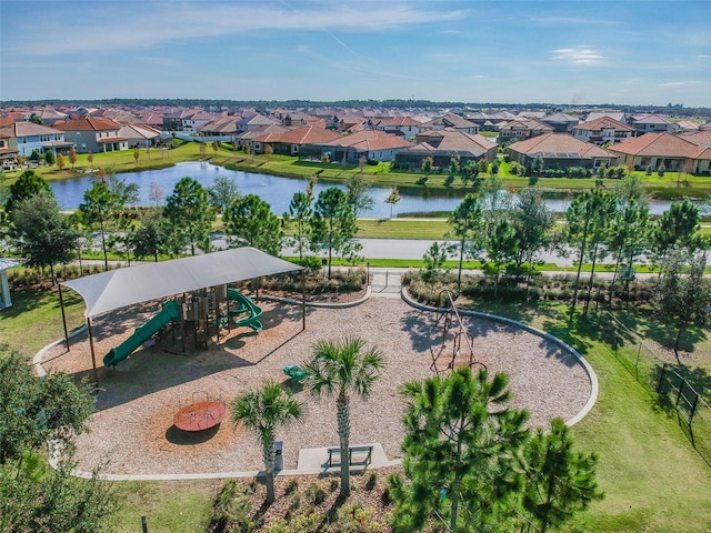 bird's eye view with a water view