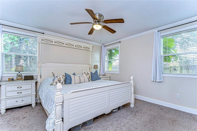 bedroom with light carpet, crown molding, and ceiling fan