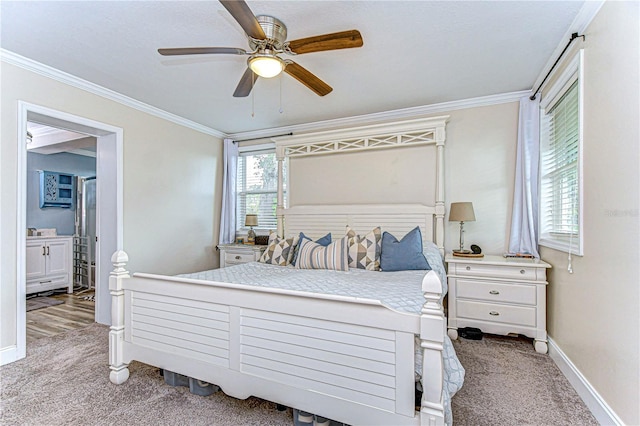 bedroom with ceiling fan, light colored carpet, ornamental molding, and multiple windows