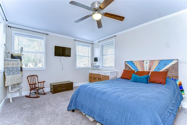 bedroom featuring crown molding, light colored carpet, and ceiling fan