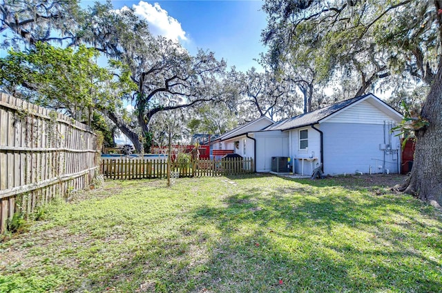 view of yard featuring central AC