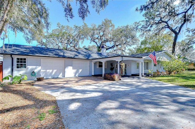 ranch-style home with a garage