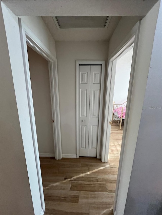 hall featuring light hardwood / wood-style floors