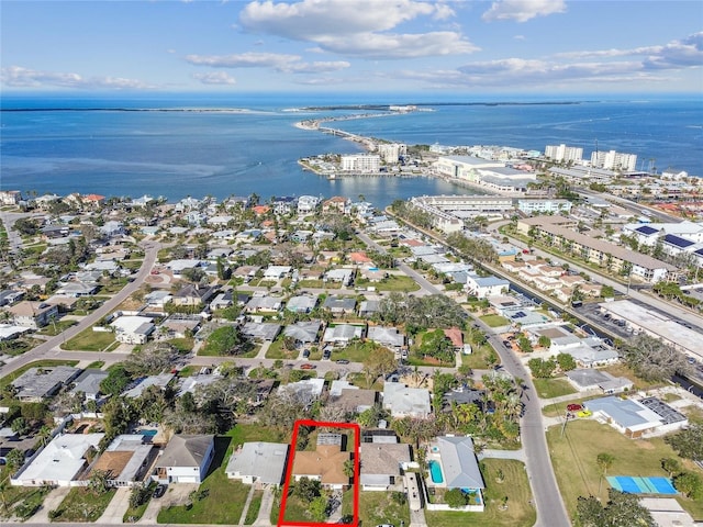 birds eye view of property featuring a water view