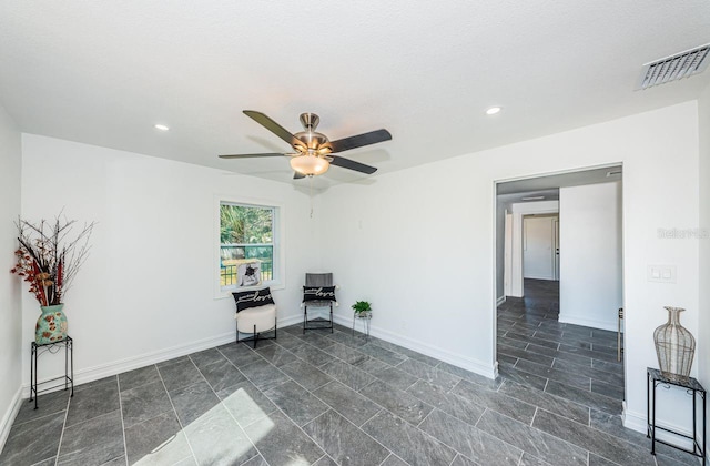 unfurnished room with ceiling fan, recessed lighting, visible vents, and baseboards