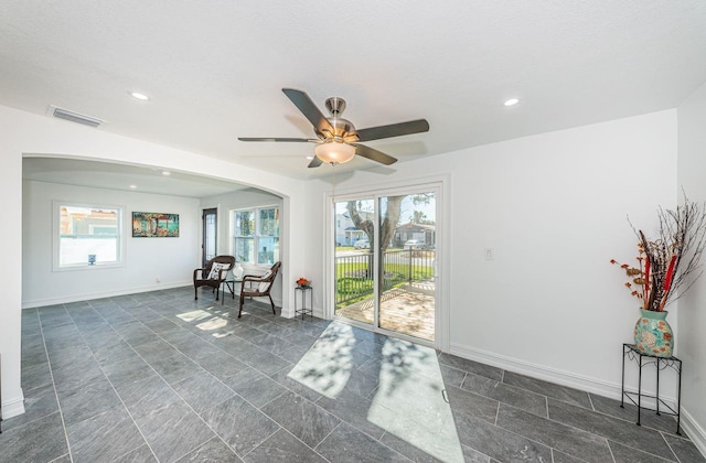 sitting room featuring ceiling fan, recessed lighting, visible vents, and baseboards