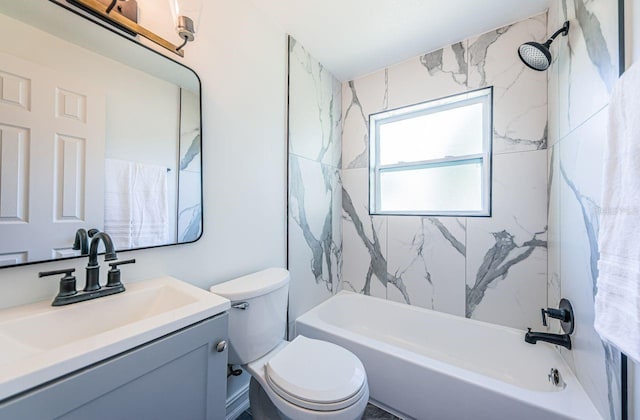 bathroom with  shower combination, vanity, and toilet