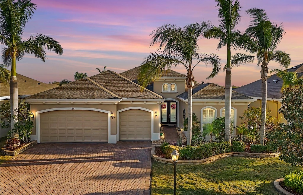 view of front of home with a garage