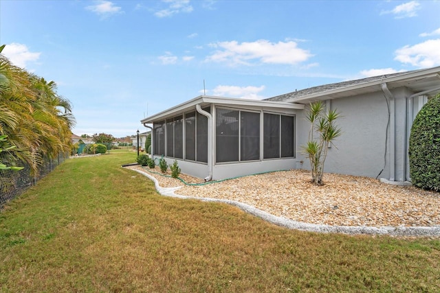 exterior space featuring a sunroom