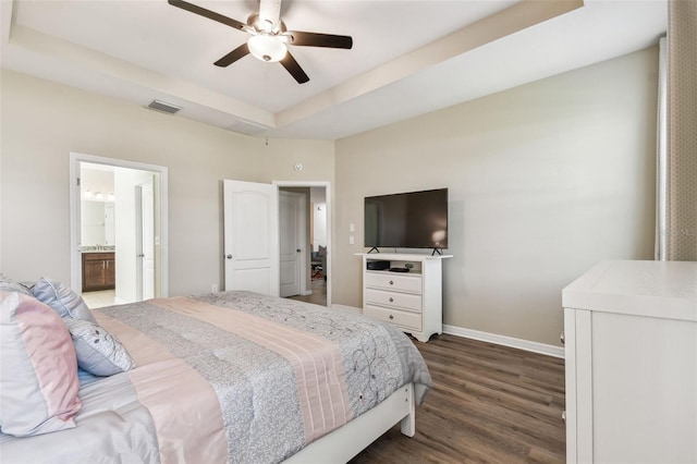 bedroom featuring visible vents, ceiling fan, baseboards, dark wood-style floors, and a raised ceiling