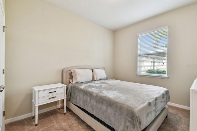 bedroom with light carpet