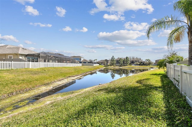 view of water feature featuring a residential view and fence